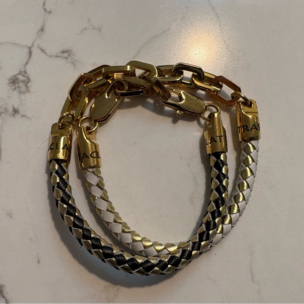 Black white and gold bracelets